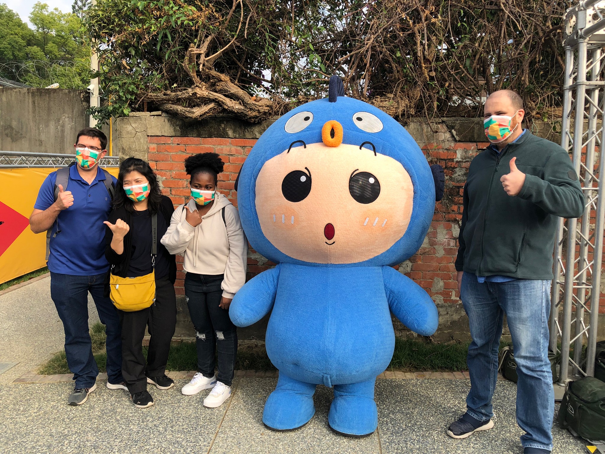 having photo with a cute mascot