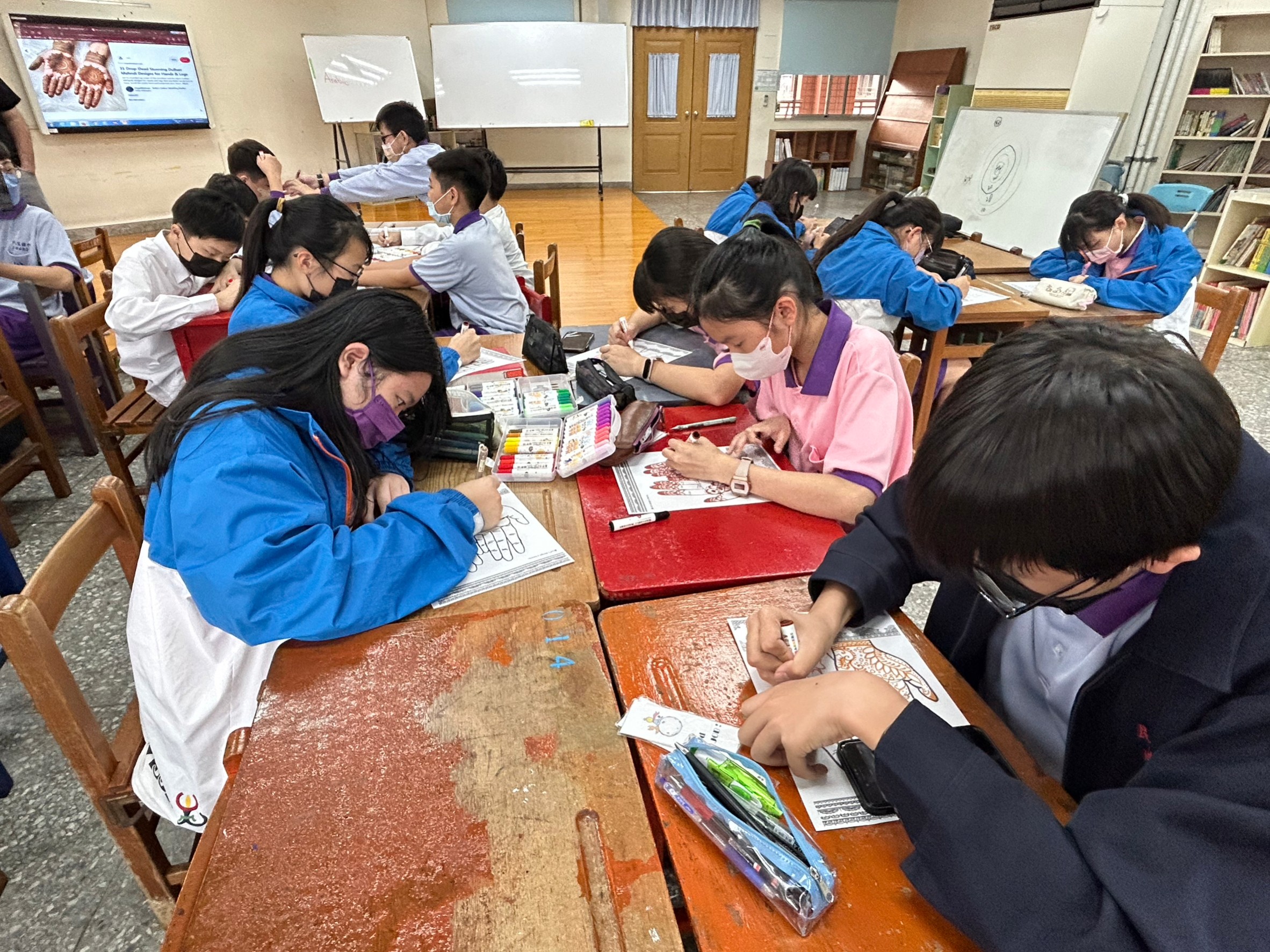 Students drew their own Henna patterns