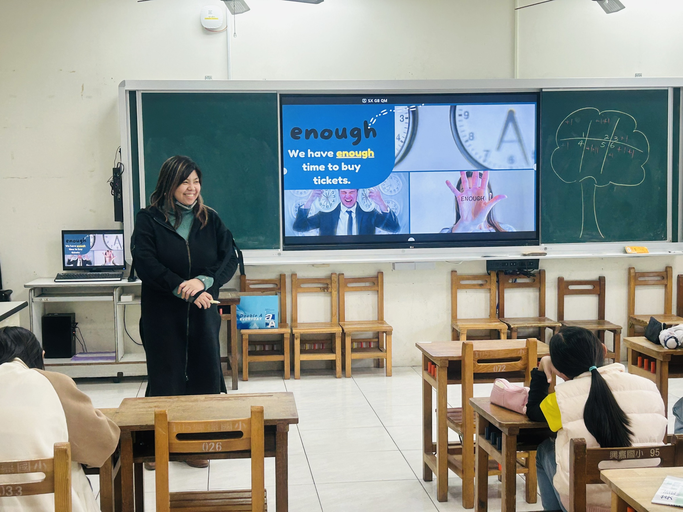 The teacher explains the vocabulary