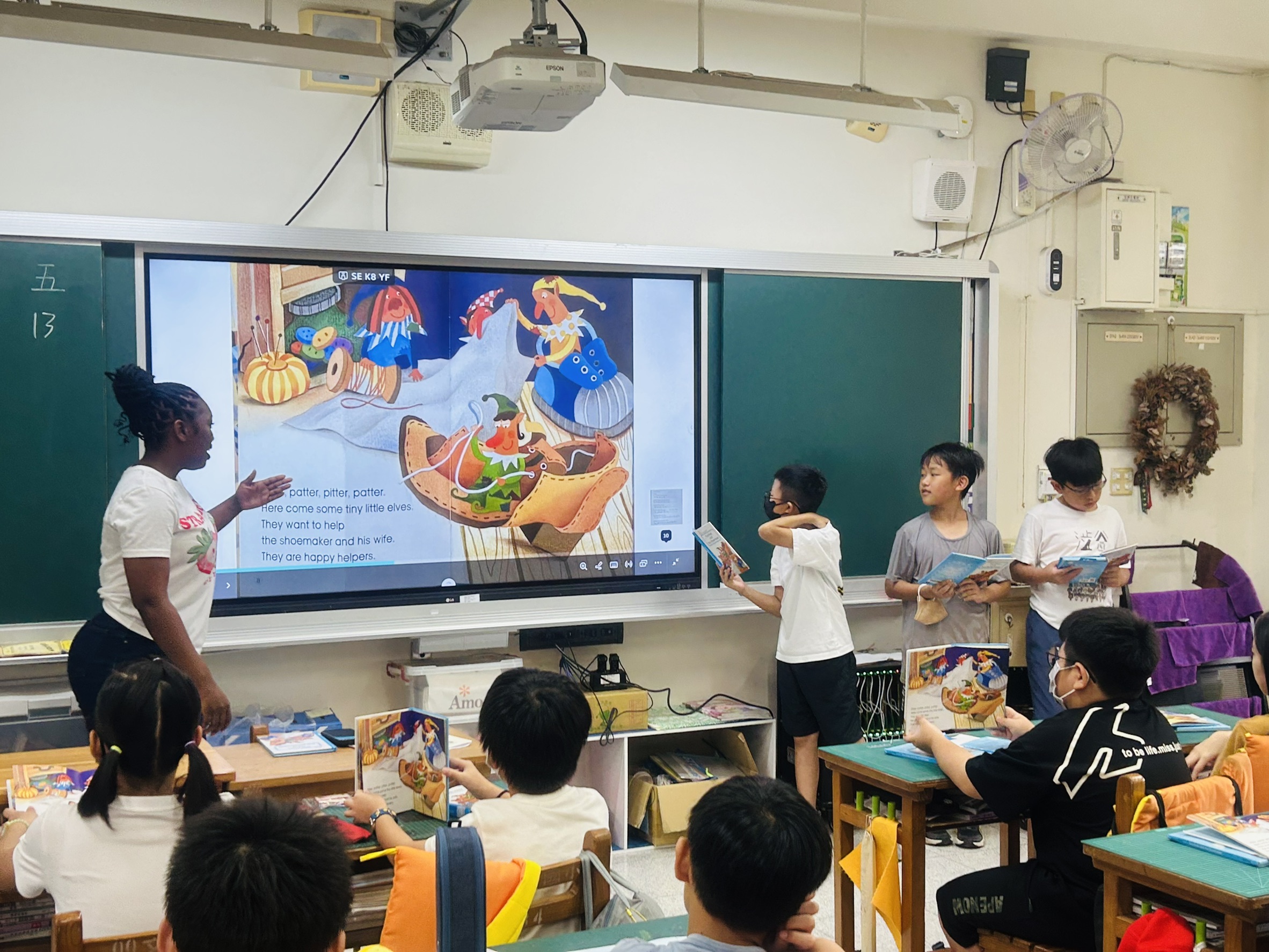 Students read the storybook