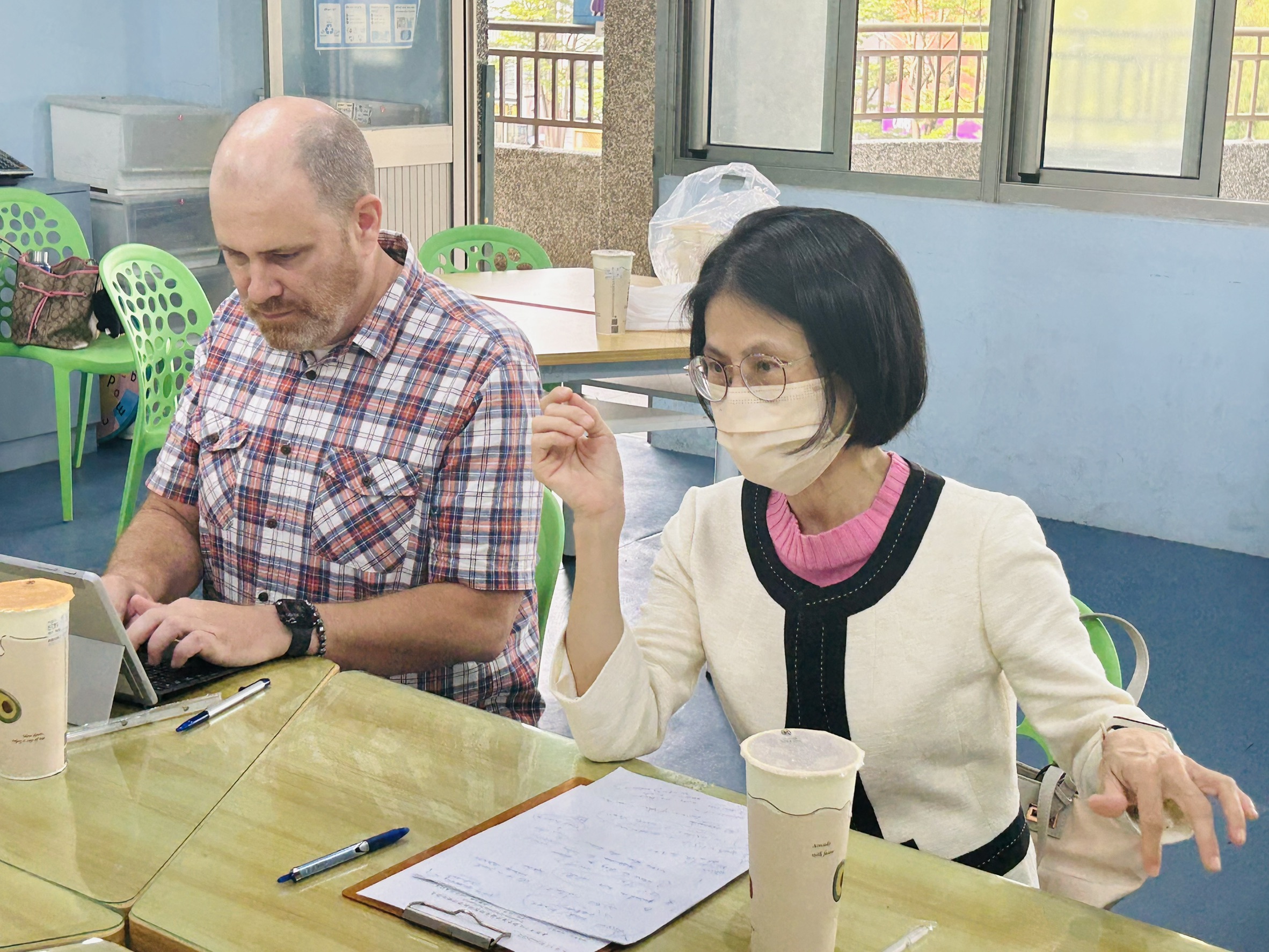 The professor gives feedback