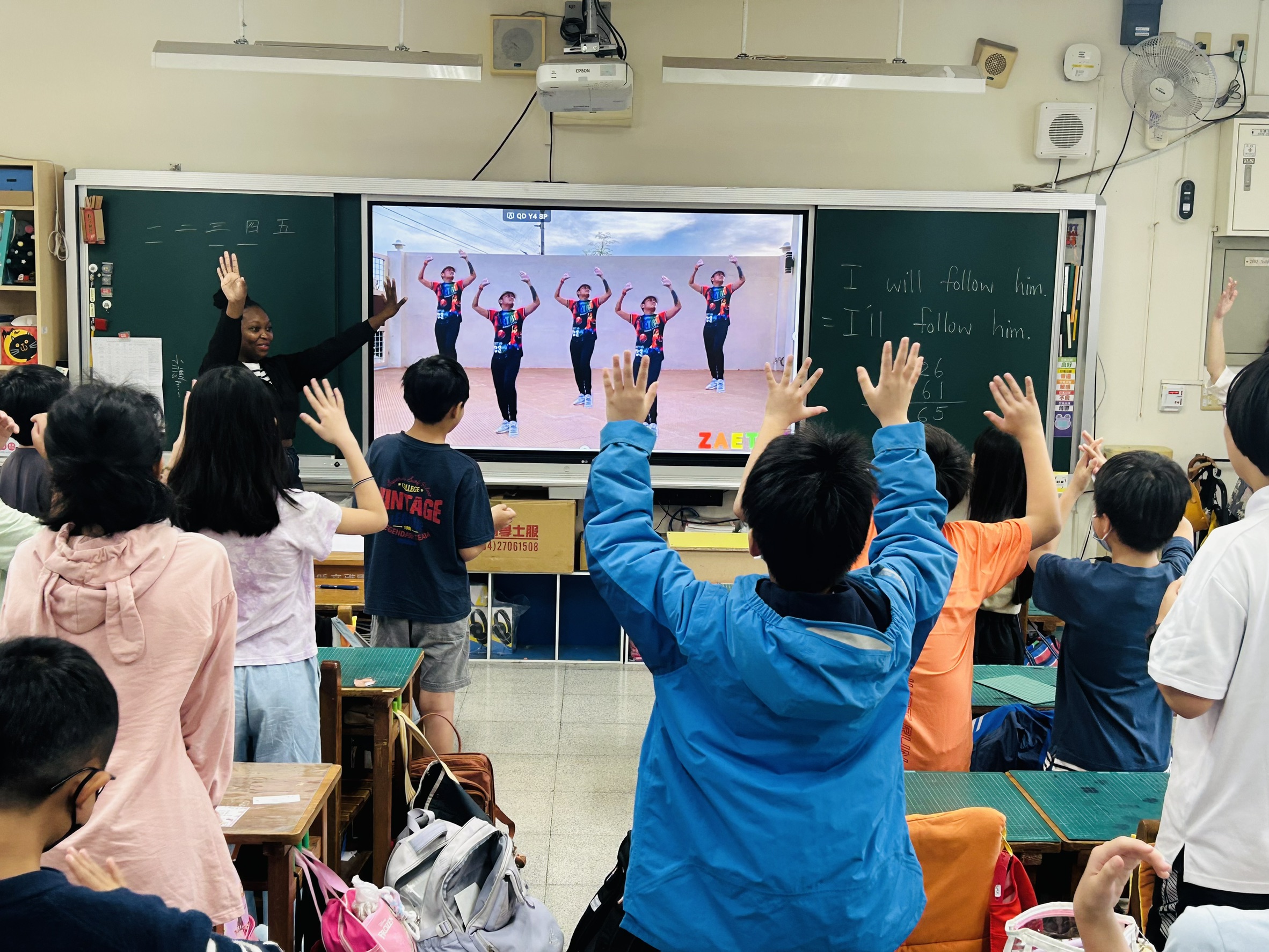 Students move along with the music