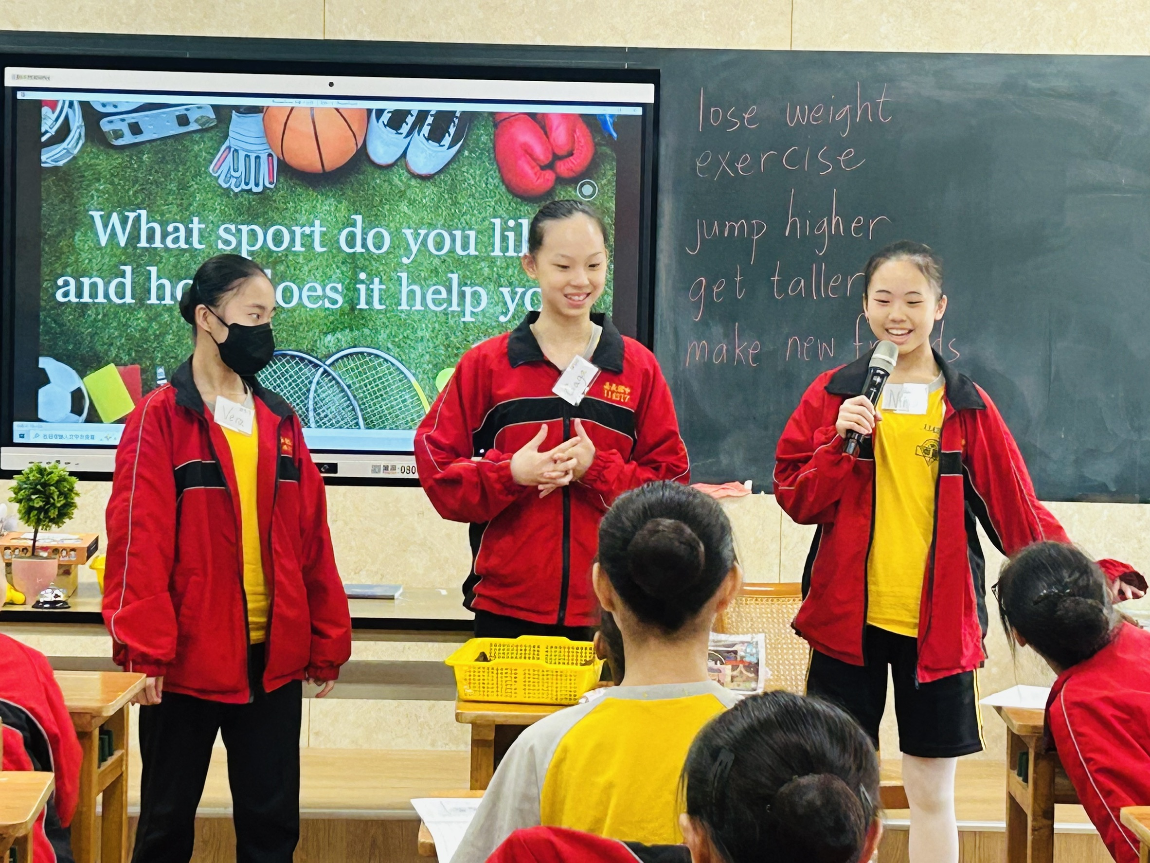 The students recite their sentences on stage