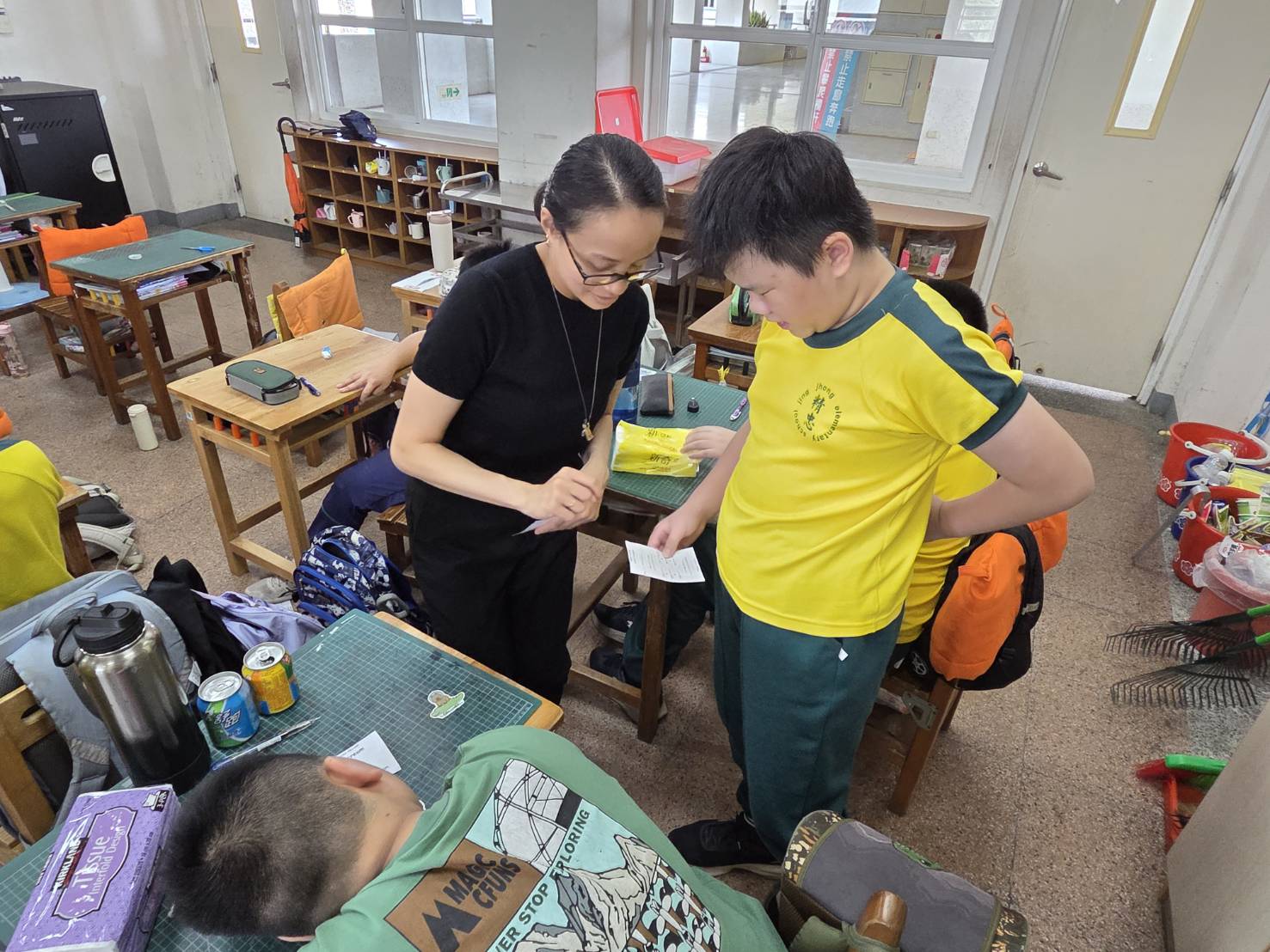 Teacher Interacting with Students