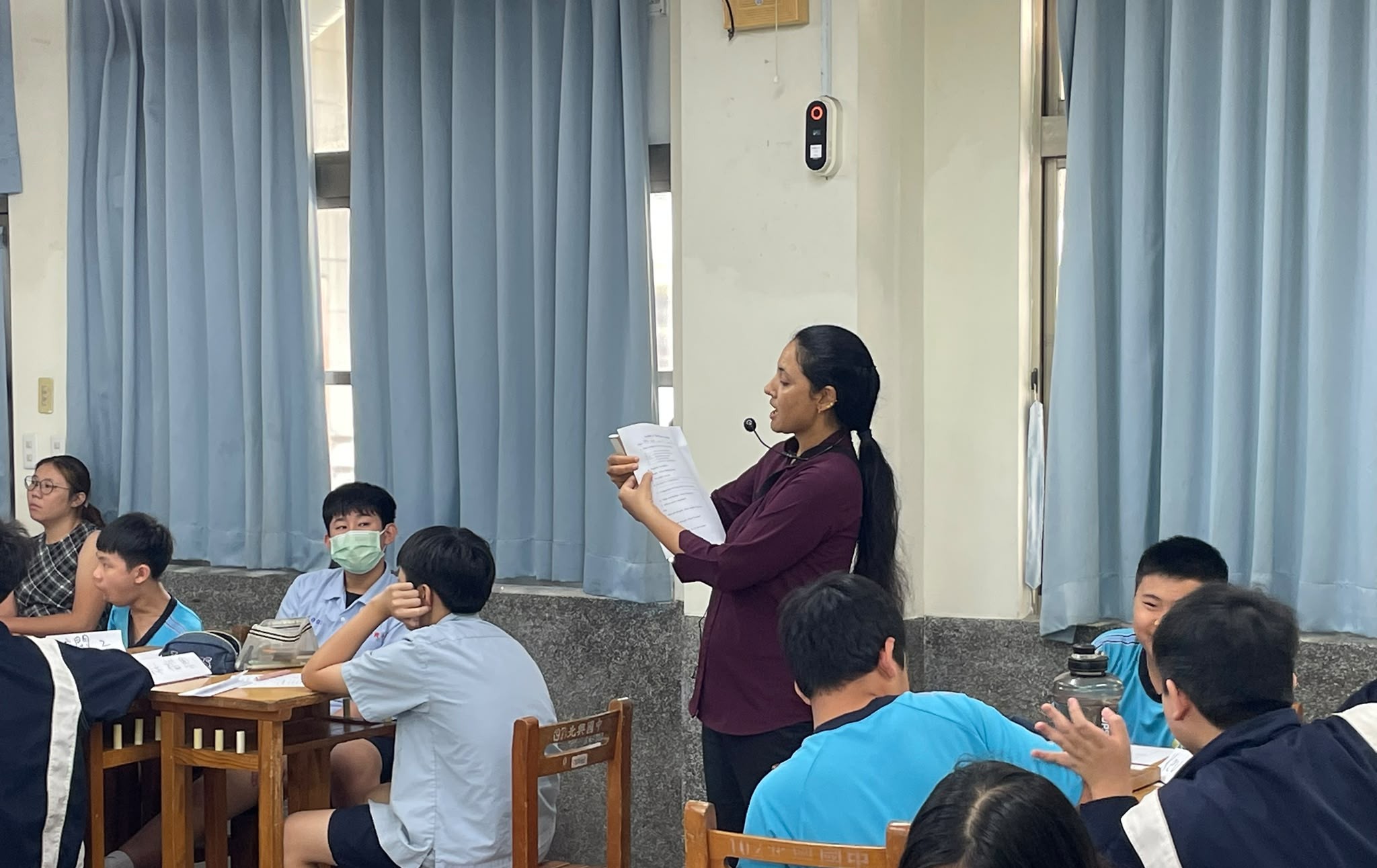 Teacher Explaining the Worksheet