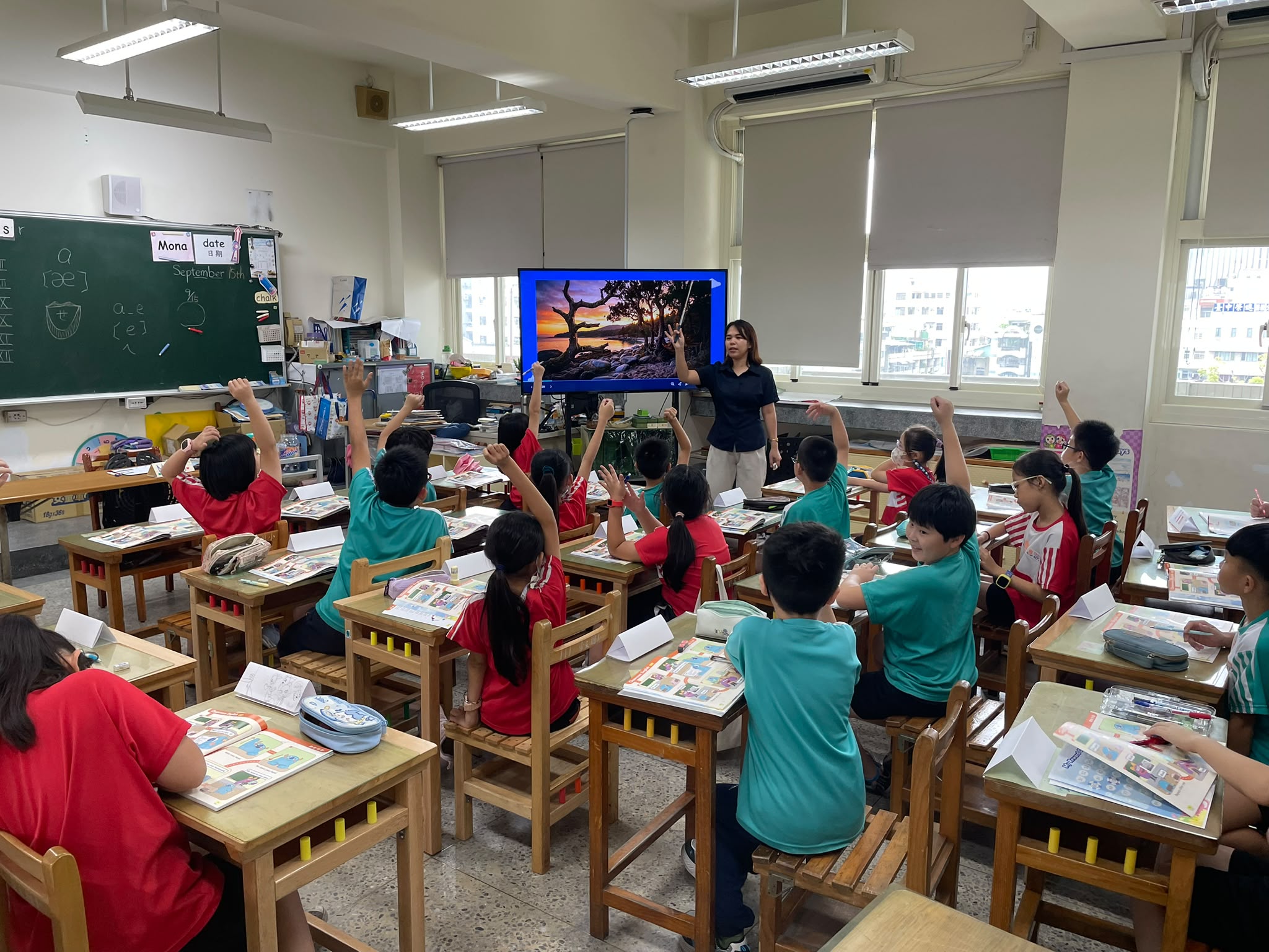 Students Eagerly Raising Their Hands
